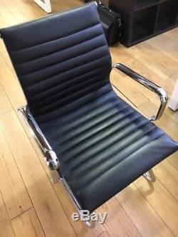 12 Black Charles Eames inspired black leather boardroom chairs (RPR £1,900)