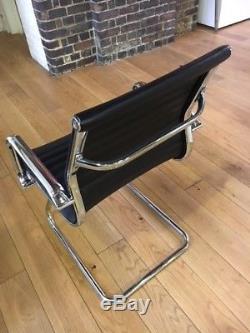 12 Black Charles Eames inspired black leather boardroom chairs (RPR £1,900)