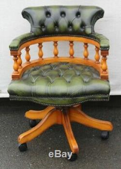1960's Green Leather Mahogany Captains Office Chair. On castors