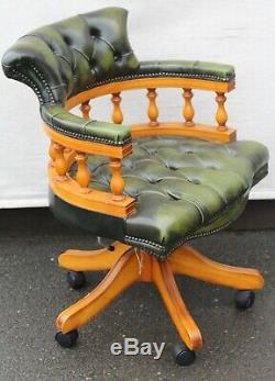 1960's Green Leather Mahogany Captains Office Chair. On castors