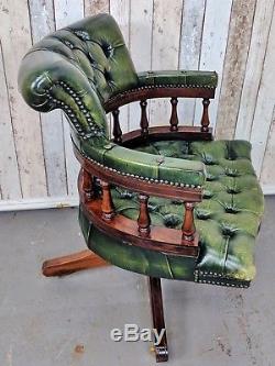An Antique Style Green Leather Button Captains Chair Delivery Available