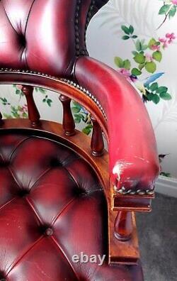 Captains Chair. Beautiful Oxblood leather Chesterfield Style swivel/office/chair