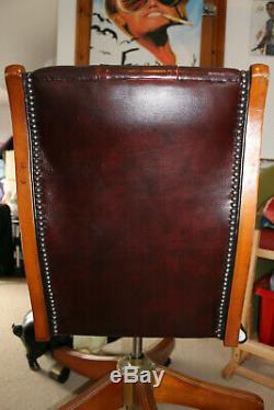 Chesterfield captain / office chair oxblood red leather