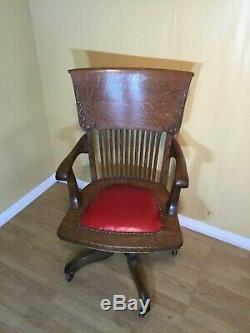 Excellent golden oak victorian tilt & swivel office chair with red leather seat