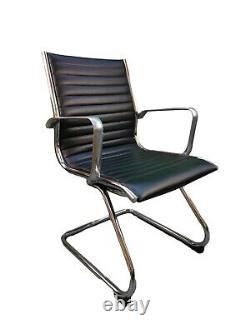 Medium back leather and chrome office manager chair fixed arms
