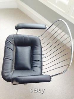 Pair of original 1960s soft leather chrome swivel office chairs very comfortable