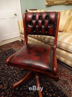 Quality Chesterfield English Oxblood leather swivel desk chair, superb design