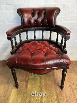 Red leather chesterfield Capatins library chair office chair