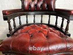Red leather chesterfield Capatins library chair office chair