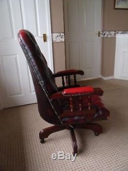 Red leather chesterfield style executive swivel office chair