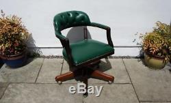 Reproduction leather, low back, directors office chair, swivel, adjustable
