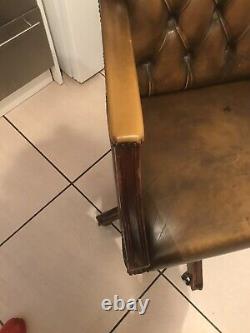 Tan leather Chesterfield swivel office Captains Chair In Excess of 28 Years Old