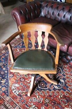 Vintage Office Revolving Swivel Chair. Oak With Green Leather Upholstery