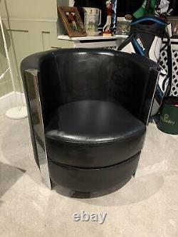 Vintage leather tub chairs