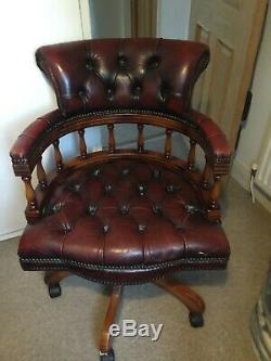 Vintage red leather chesterfield captains chair